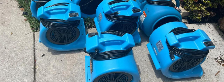 Water Restoration tools outside of a home in Pompano Beach, FL